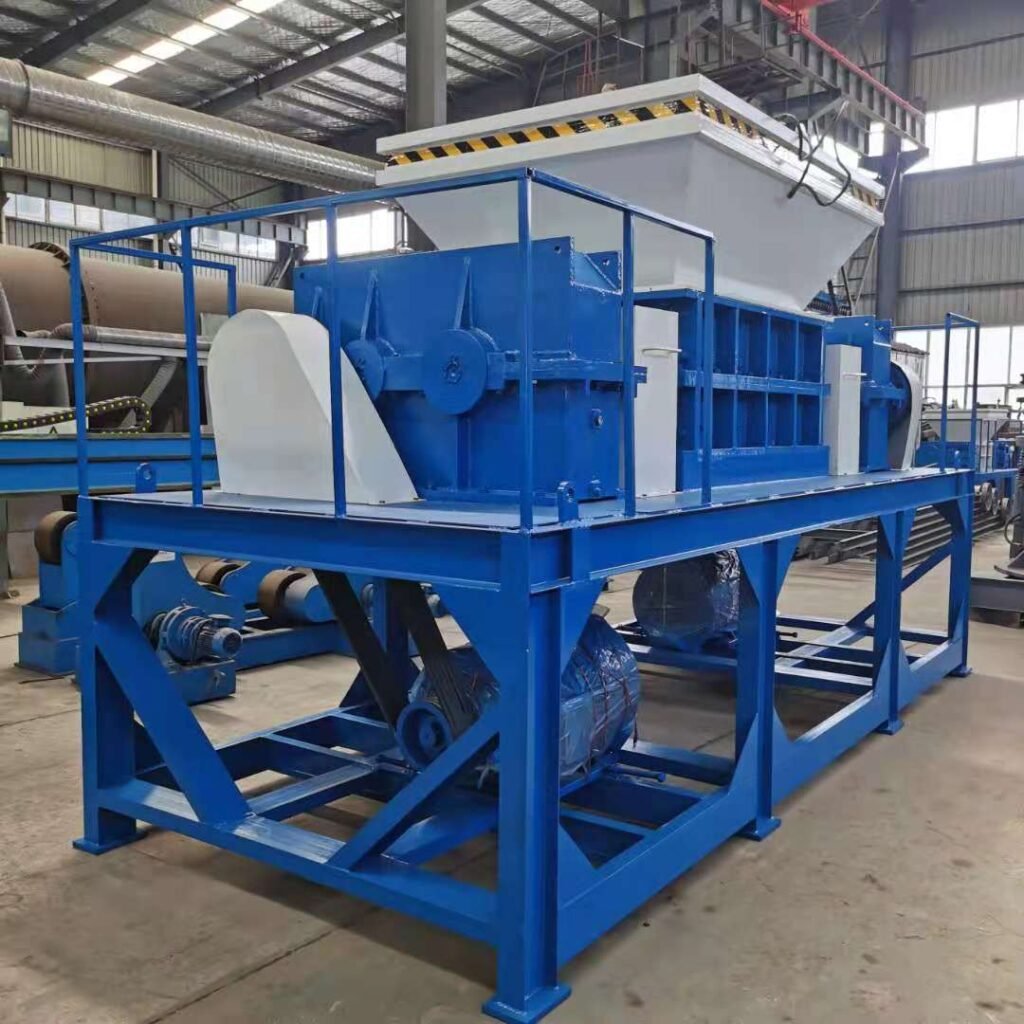 A robust, large, double shaft shredder machine with a powerful motor, used for industrial waste reduction