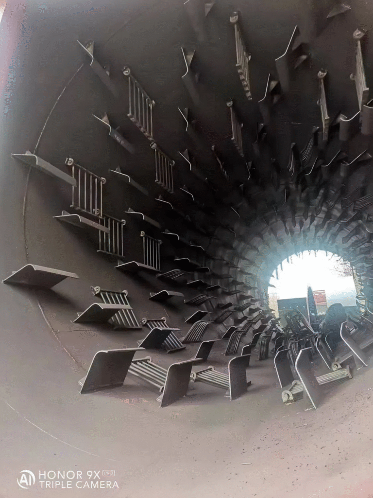 High-efficiency rotary wood chip dryer used for reducing moisture in wood chips.