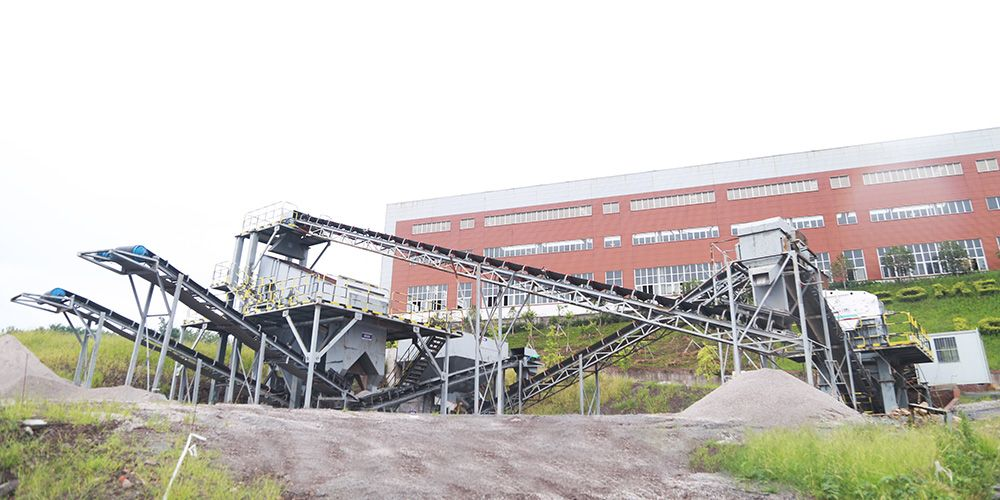 Sorted crushed stone aggregate piles produced by stone production line